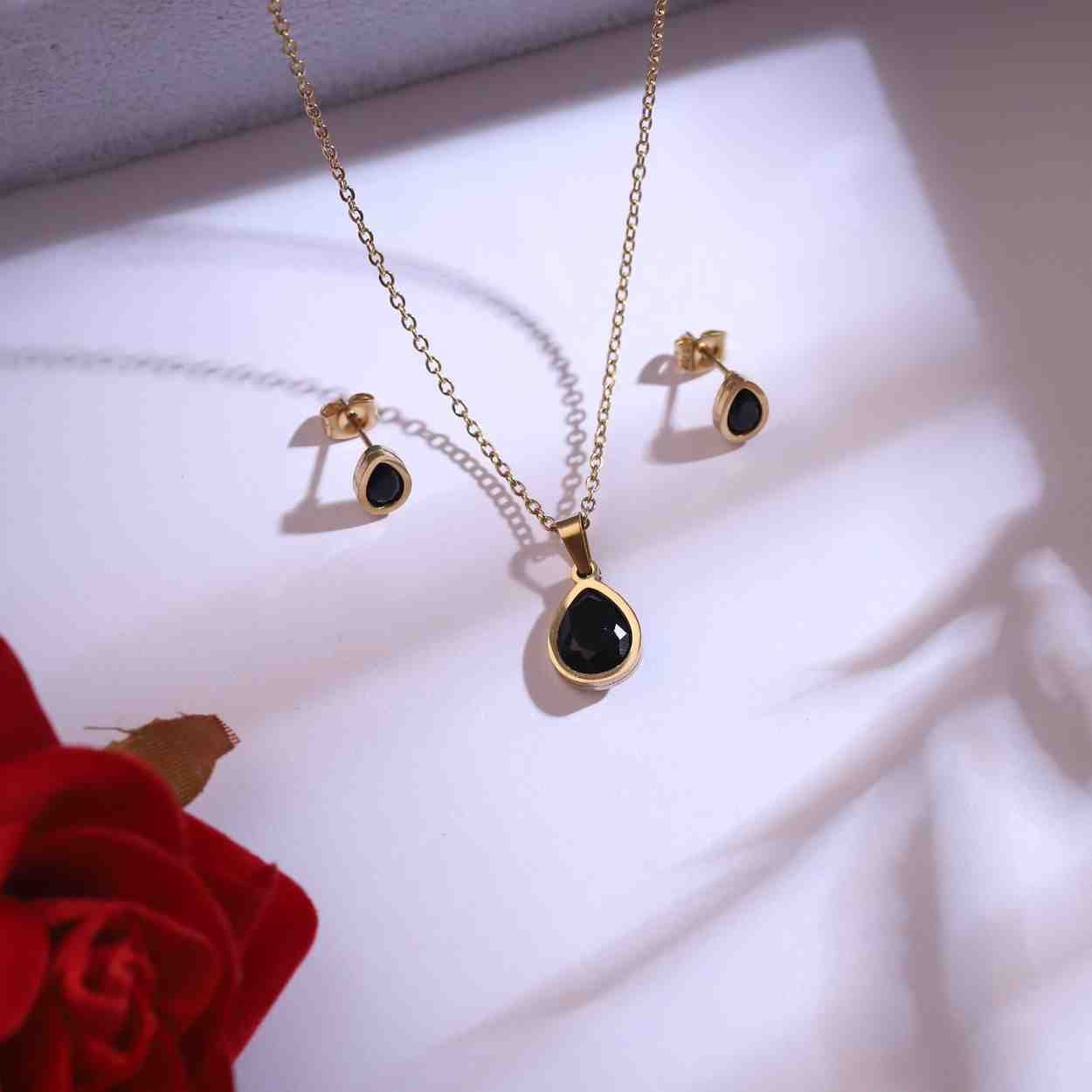 Golden Teardrop Black Stone Pendant & Earrings Set